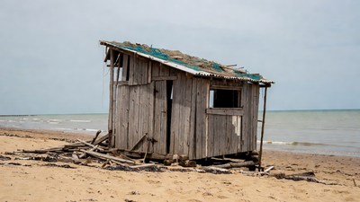 Rustic wooden shack on beach