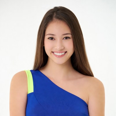 Asian woman smiling in blue one-shoulder top