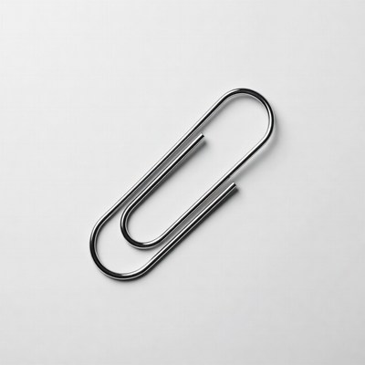 Silver paper clip isolated