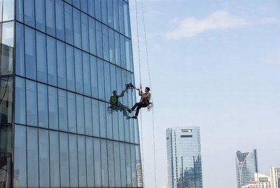 Window cleaner on skyscraper