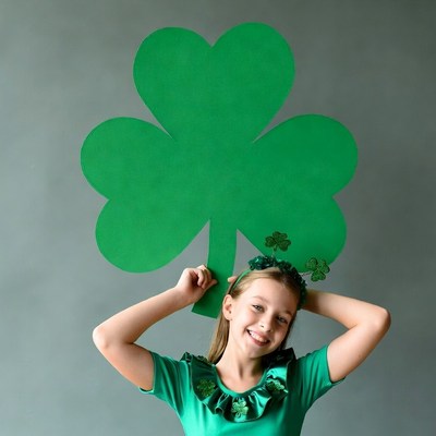 Girl holding large shamrock