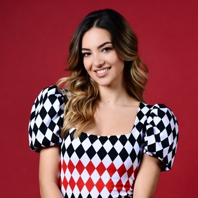 Woman in black white red harlequin dress