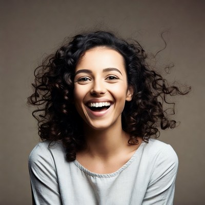 Smiling woman with curly hair