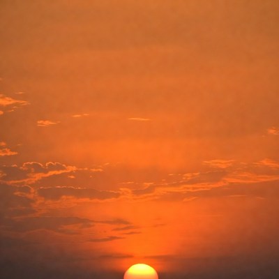 Sunset Sun Over Orange Clouds