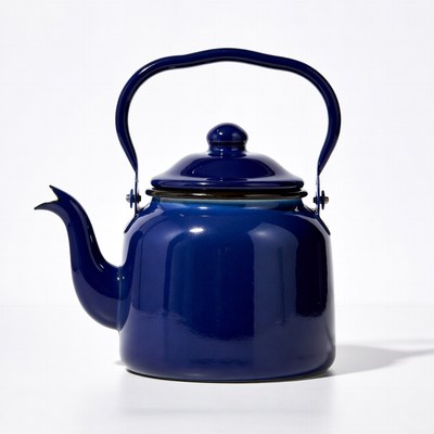 Blue enamel teapot isolated