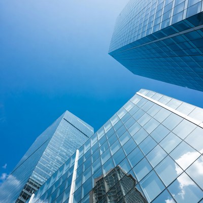 Skyscrapers Towering Against Blue Sky