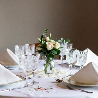 Elegant Table Set with Wine Glasses
