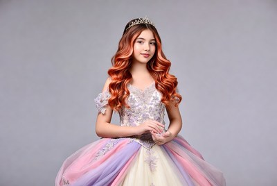 Girl in multicolored gown with tiara