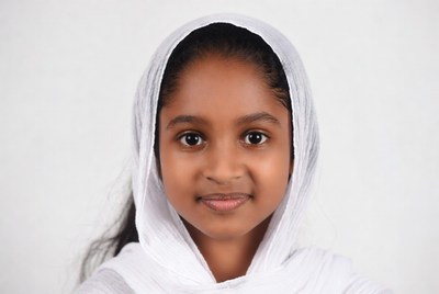 Young Indian girl wearing white hijab