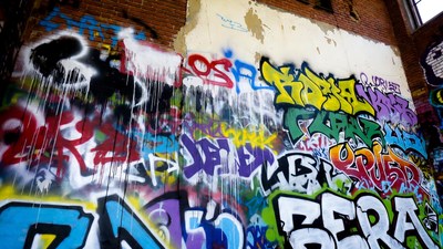 Colorful graffiti on brick wall