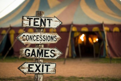 Carnival Signpost with Tent Background