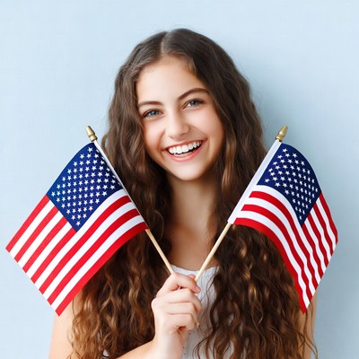 Girl holding American flags