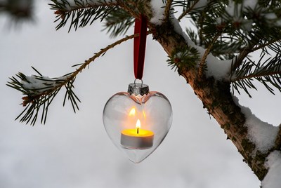 Heart Ornament with Candle on Snowy Pine