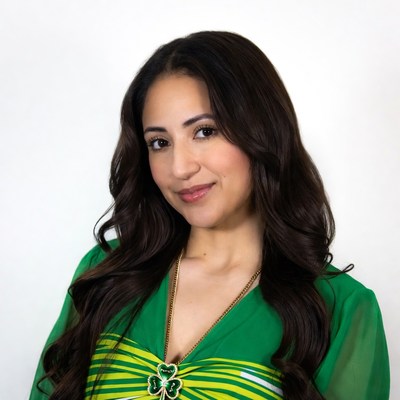 Woman in green dress with shamrock necklace