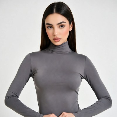 Woman in gray turtleneck top