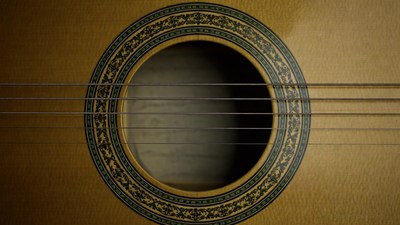 Classical guitar sound hole closeup
