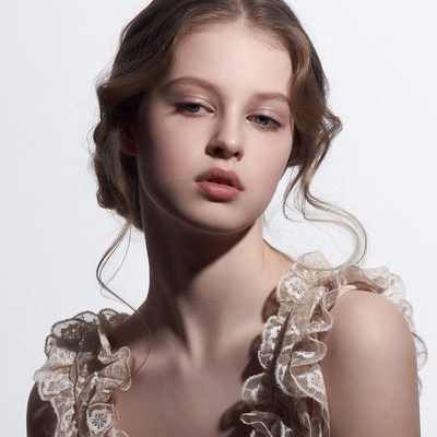 Young woman in lace dress portrait
