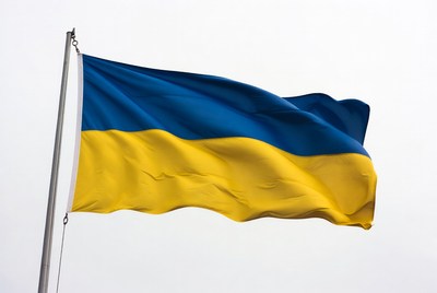 Ukrainian flag waving on pole