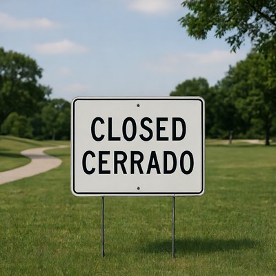 Closed Cerrado Sign in Park