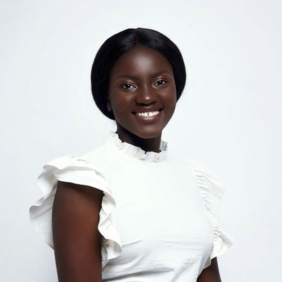 Smiling African-American woman in white blouse