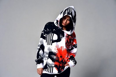 Asian woman in abstract print hoodie