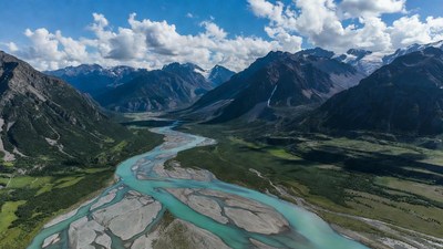 Turquoise River in Mountain Valley