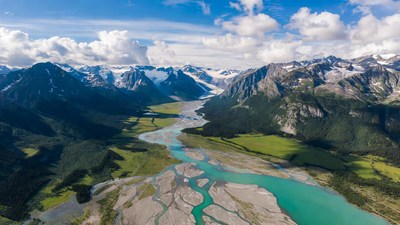 Turquoise River in Snowy Mountains