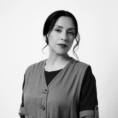 Latina woman in vest portrait