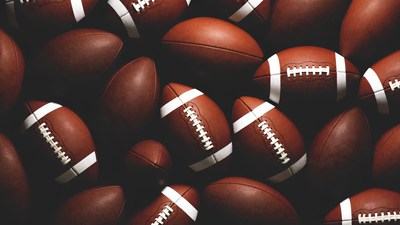 Pile of American Footballs