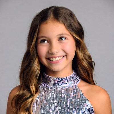 Smiling girl in sequin dress