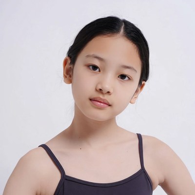 Asian girl in black camisole top