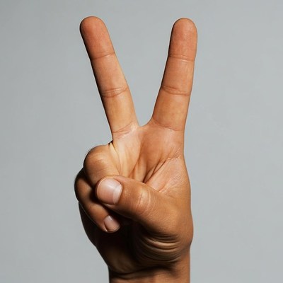 Hand making peace sign