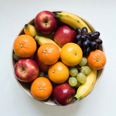 Fruit Bowl with Apples Oranges Bananas Grapes