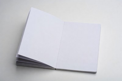 Open Blank Notebook on White Background