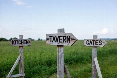 Kitchen Tavern Gates Wooden Signs in Field