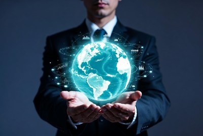 Man holding glowing digital globe