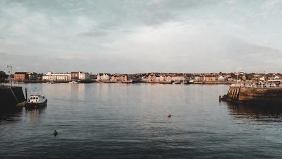Harbor with boats and waterfront buildings