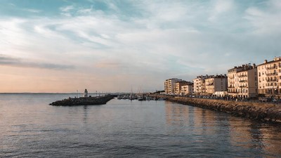 Sunset Harbor with Colorful Buildings