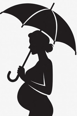 Silhouette of pregnant woman with umbrella