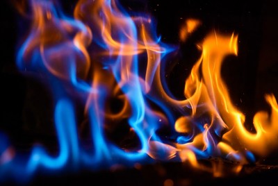 Blue and orange flames on black background