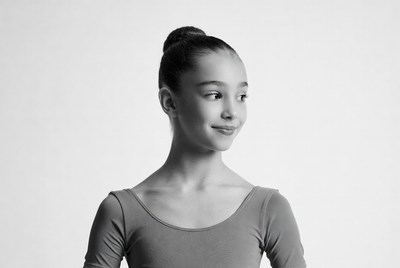Young girl ballerina smiling