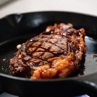 Seared Ribeye Steak in Cast Iron Skillet