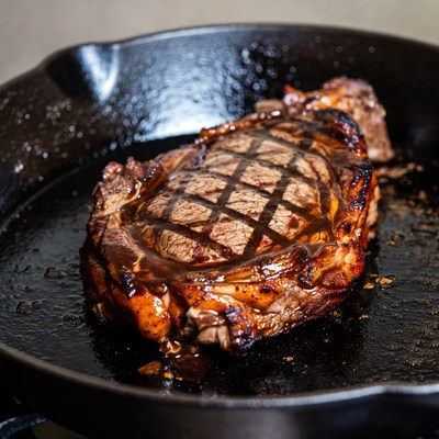 Grilled Ribeye Steak in Cast Iron Skillet