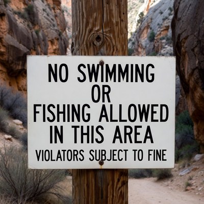 No Swimming or Fishing Sign in Canyon