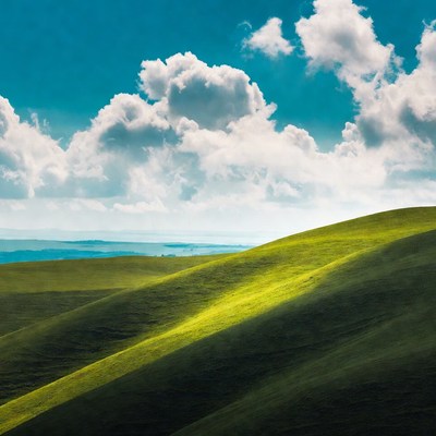 Rolling Green Hills Under Blue Sky