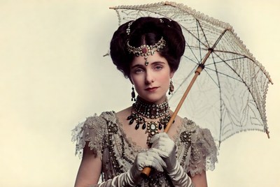 Victorian woman holding lace umbrella