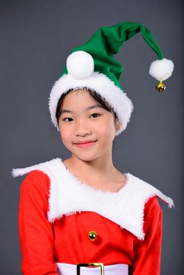Asian girl in Santa elf costume
