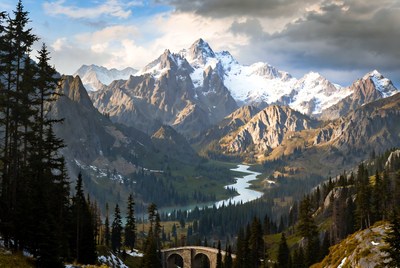 Majestic Snowy Mountains with River and Bridge