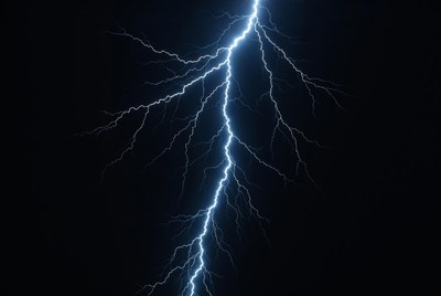 Bright Lightning Bolt Striking Dark Sky