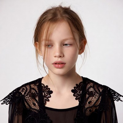 Teen girl in black lace top